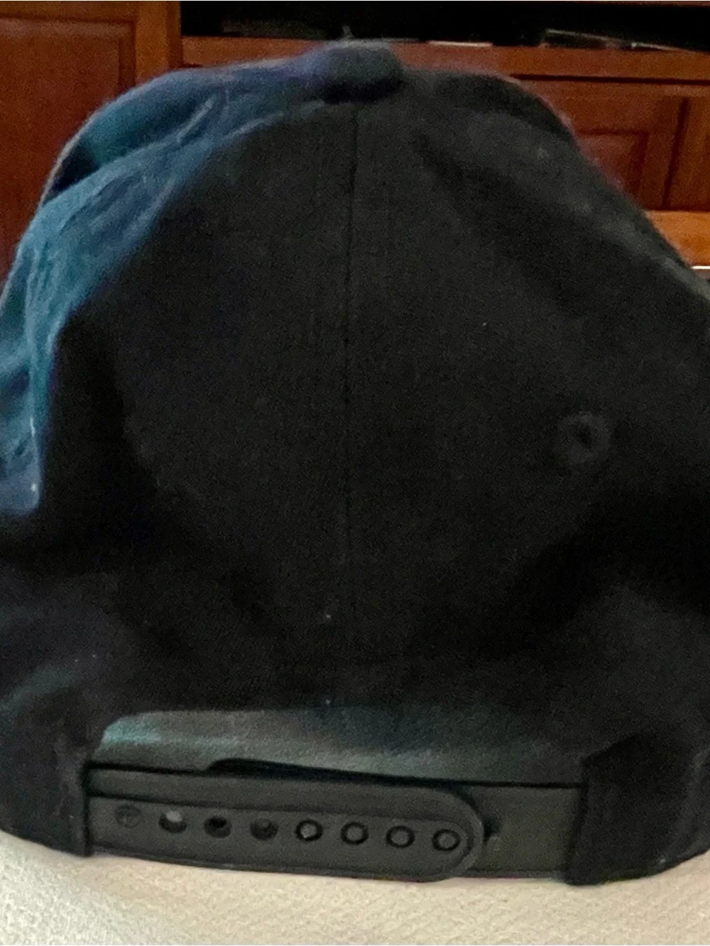 Genuine Merchandise Black Cap with White Logo Tag